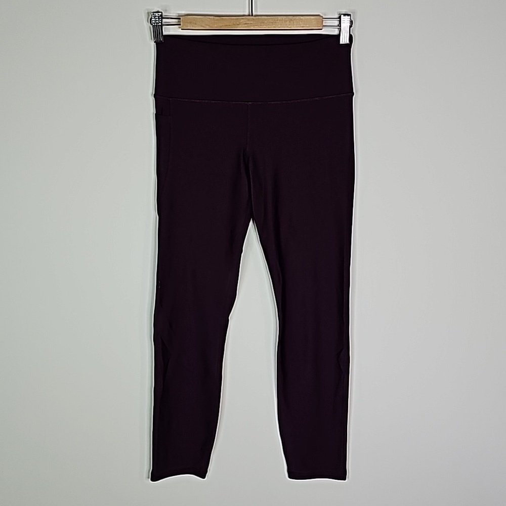 UNDER Armour medium purple heatgear compression leggings